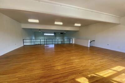 The mezzanine level above the warehouse floor.
